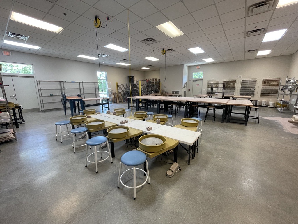 Studio with tables and pottery wheels