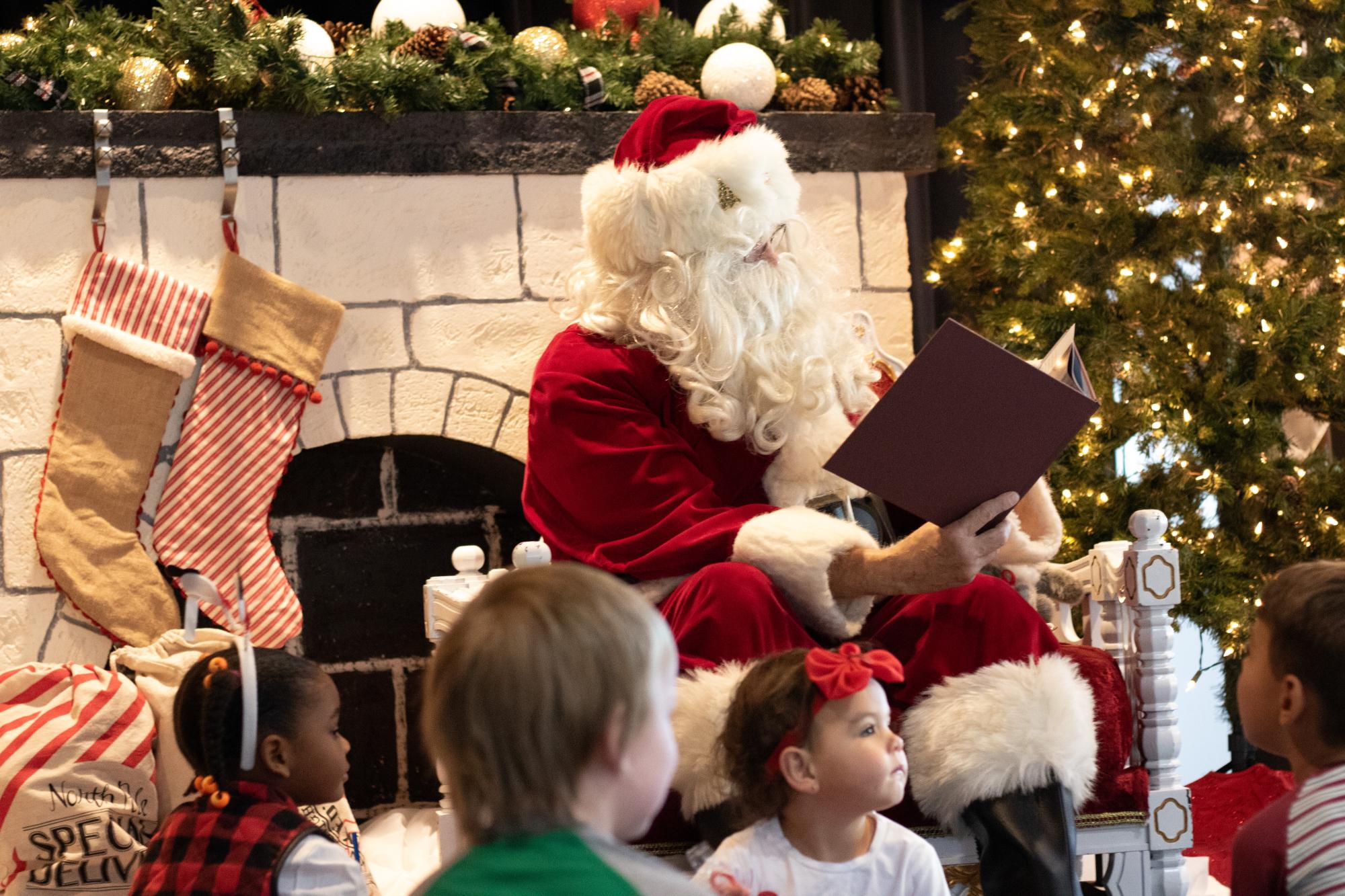 Santa reading to children